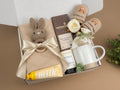 New Mom Gift Set – Knitted Baby Blanket, Crochet Bunny Rattle & Self-Care Treats